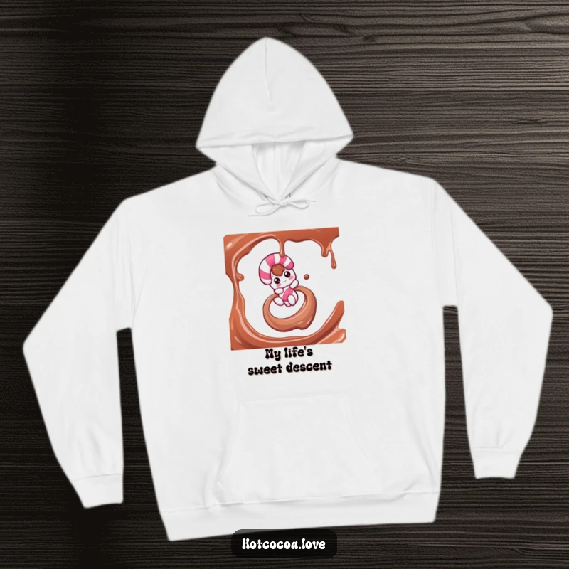 Funny hoodie featuring a candy cane character gracefully sliding down a chocolate syrup swirl, offering warmth and holiday spirit.