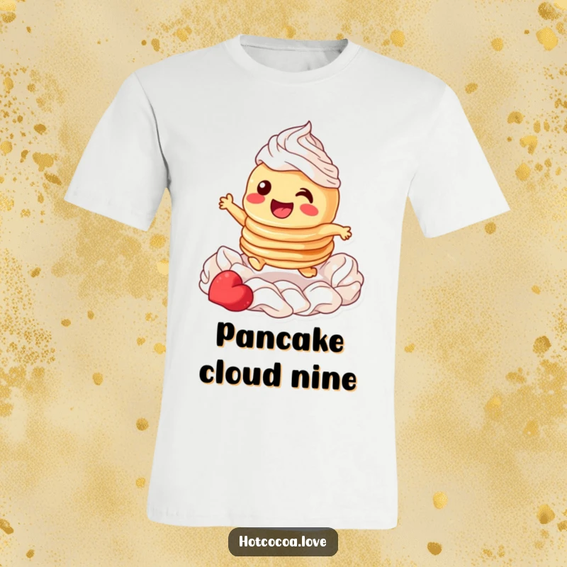 Funny t-shirt depicting a giggling stack of pancakes character joyfully leaping straight through a generous swirl of whipped cream.